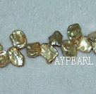 Freshwater pearl beads, golden, 5*11*13mm top-drilled keshi. Sold per 15-inch strand.