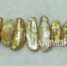 Biwa freshwater pearl beads, golden, 5*8*21 mm keshi. Sold per 15-inch strand.