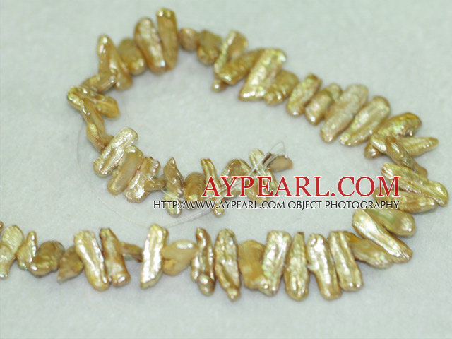 Biwa freshwater pearl beads, golden, 5*8*21 mm keshi. Sold per 15-inch strand.