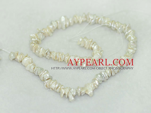 Freshwater pearl beads, white, 5*9mm keshi. Sold per 15-inch strand.