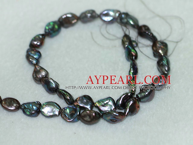 Freshwater pearl beads, black, 5*12*16 mm side-drilled keshi. Sold per 15.7-inch strand.