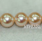 Freshwater pearl beads, orange, 8-9mm round. AA grade. Sold per 15.7-inch strands