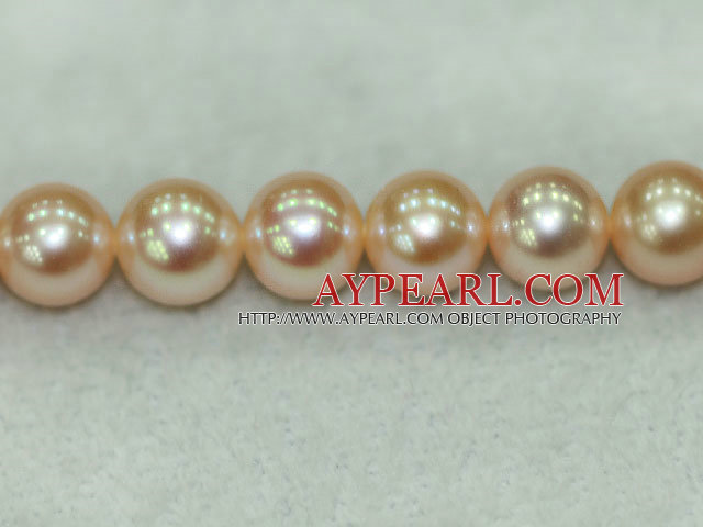 Freshwater pearl beads, orange, 8-9mm round. AA grade. Sold per 15.7-inch strands