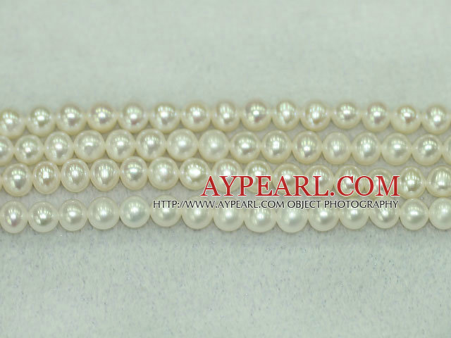 Freshwater pearl beads, white, 6-7mm round. A grade. Sold per 15.7-inch strand