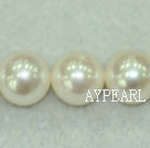 Freshwater pearl beads, white, 10-11mm round. A grade. Sold per 15.7-inch strand.