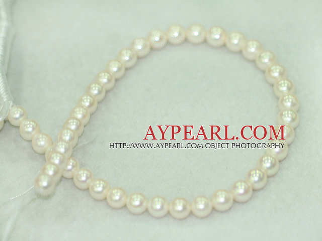 Freshwater pearl beads, white, 10-11mm round. A grade. Sold per 15.7-inch strand.